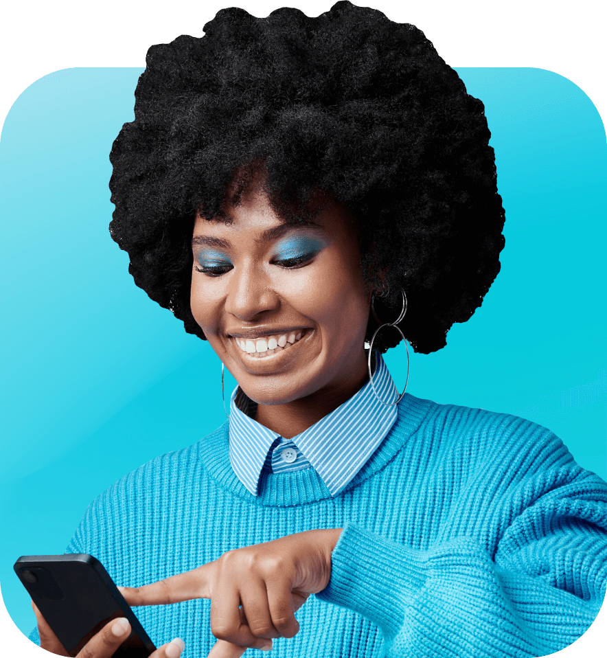 Woman smiling while interacting with phone